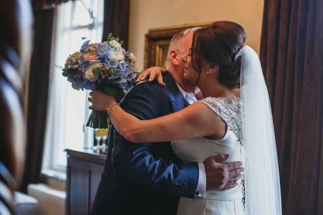 Stan-Seaton-photography-bride-getting-ready-greeting-father