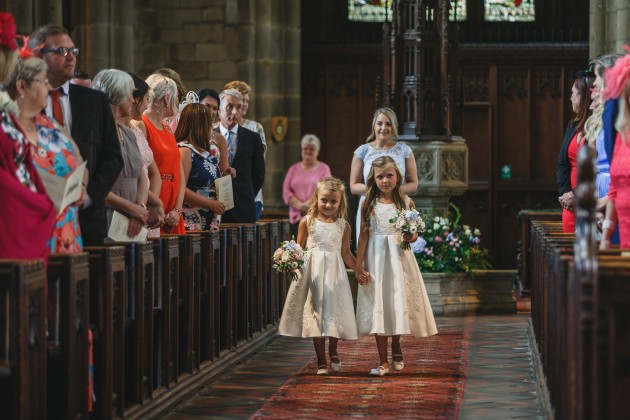 Stan-Seaton-Photography-bridesmaids-entering-the-church