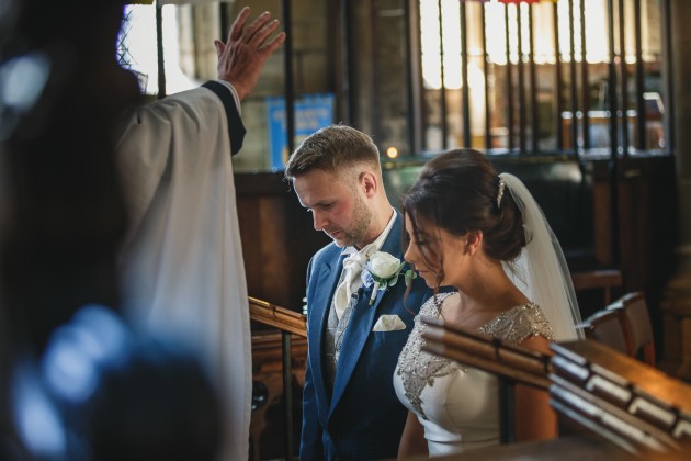 Stan-Seaton-Photography-bride-and-groom-being-blessed