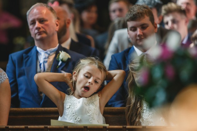 Stan-Seaton-Photography-young-bridesmaid-yawning