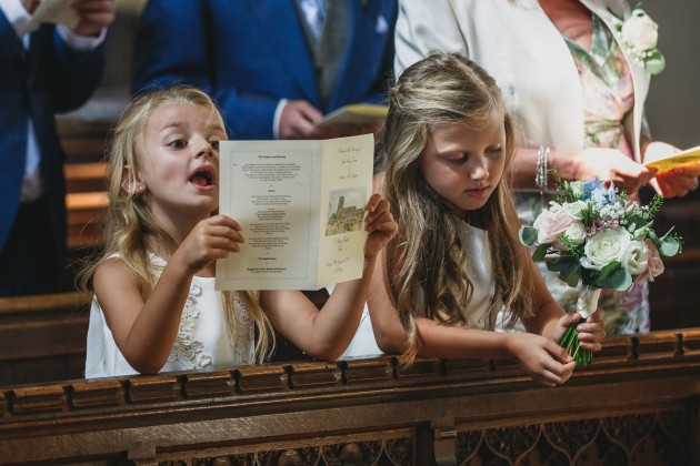 Stan-Seaton-Photography-young-bridesmaids-entering-the-church