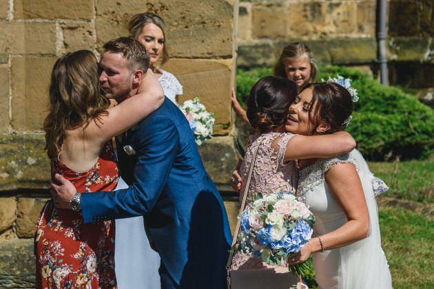 Stan-Seaton-Photography-bride-and-groom-greeting-guests