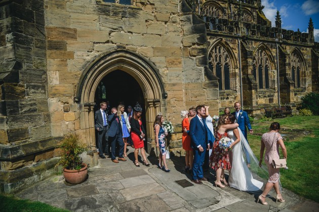 Stan-Seaton-Photography-bride-and-groom-greeting-guests