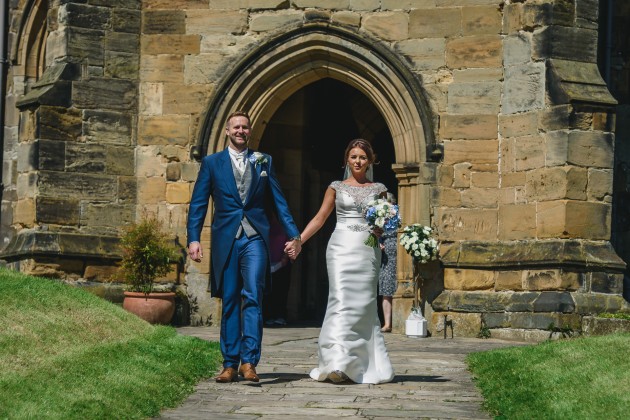 Stan-Seaton-Photography-bride-and-groom-walking-out-of-the-church