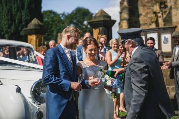 tan-Seaton-Photography-opening-champagne-at-church-gate