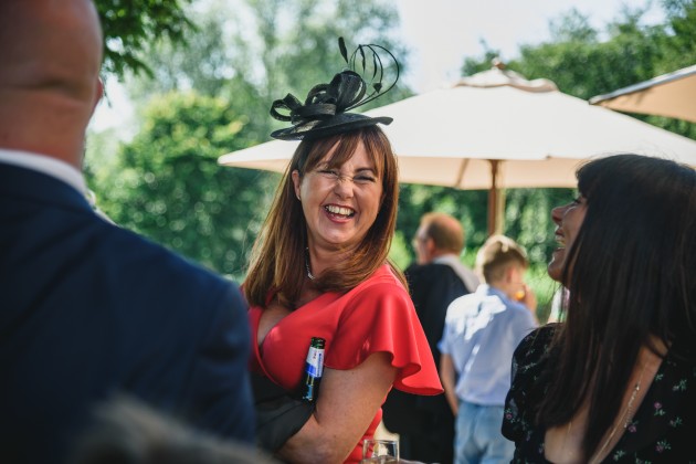 tan-Seaton-Photography-Headlam-Hall-wedding-guests-chatting