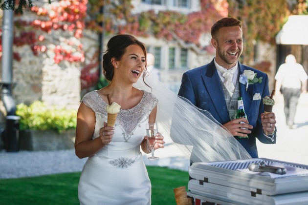 tan-Seaton-Photography-Headlam-Hall-wedding-bride-and-groom-eating-ice-cream