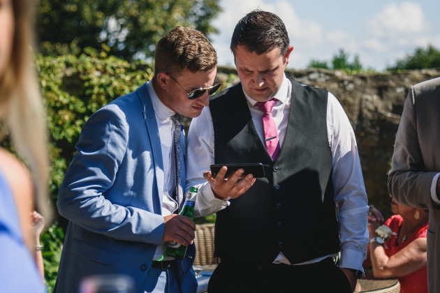 Stan-Seaton-Photography-Headlam-Hall-wedding-guests-chatting