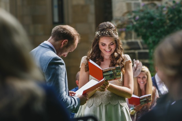 027 Durham-Wedding-Photographer-Stan-Seaton-bride-and-groom-in-ceremony.JPG