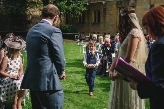 032 Durham-Castle-Wedding-Photographer-Stan-Seaton-ceremony-ring-bearer.JPG