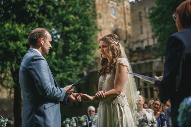 033 Durham-Castle-Wedding-Photographer-Stan-Seaton-bride-and-groom-exchanging views.JPG