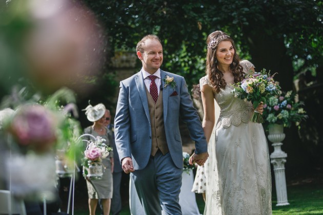 042 Durham-Castle-Wedding-Photographer-Stan-Seaton-bride-and-groom-walking-down-the-aisle.JPG