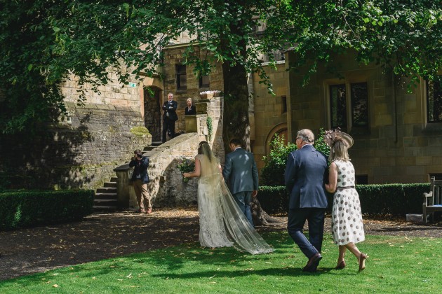 043 Durham-Castle-Wedding-Photographer-Stan-Seaton-bride-and-groom-walking-down-the-aisle.JPG