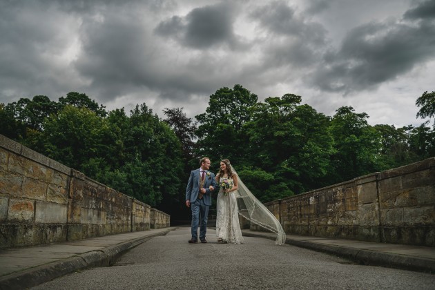 056 Durham-Castle-Wedding-Photographer-Stan-Seaton-bride-and-groom-on-Prebends-bridge.JPG