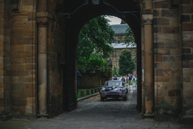 076 Durham-Castle-Wedding-Photographer-Stan-Seaton-Bride-and-groom-returning-tothe-castle.JPG