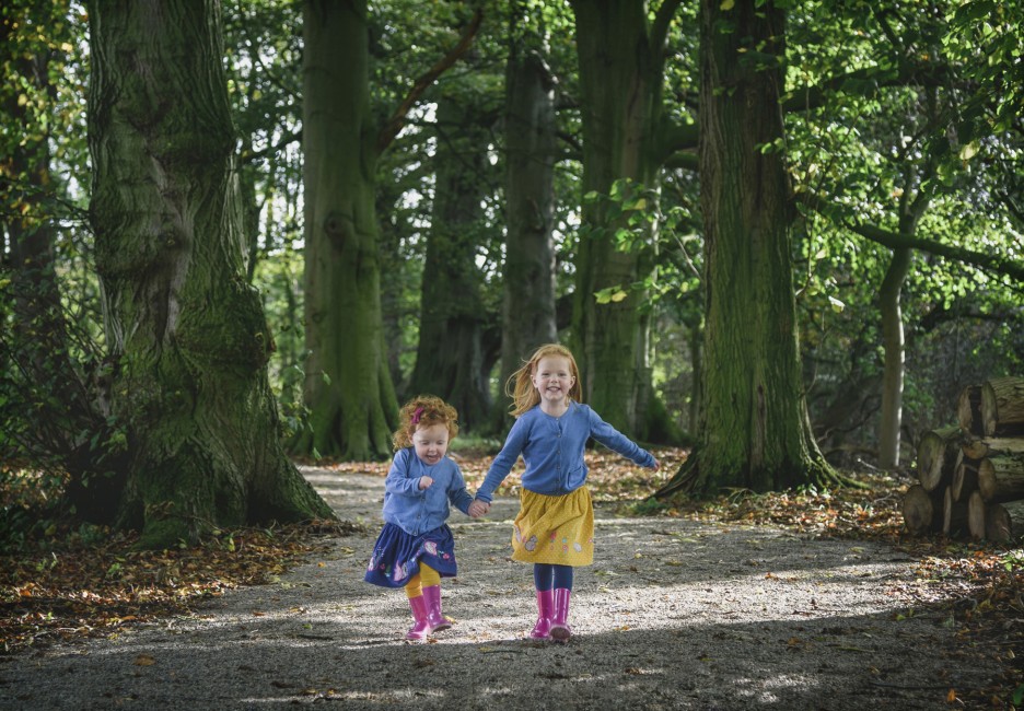 Stan-Seaton-Portrait-Photography-Sisters holding-hands-and-running.jpg